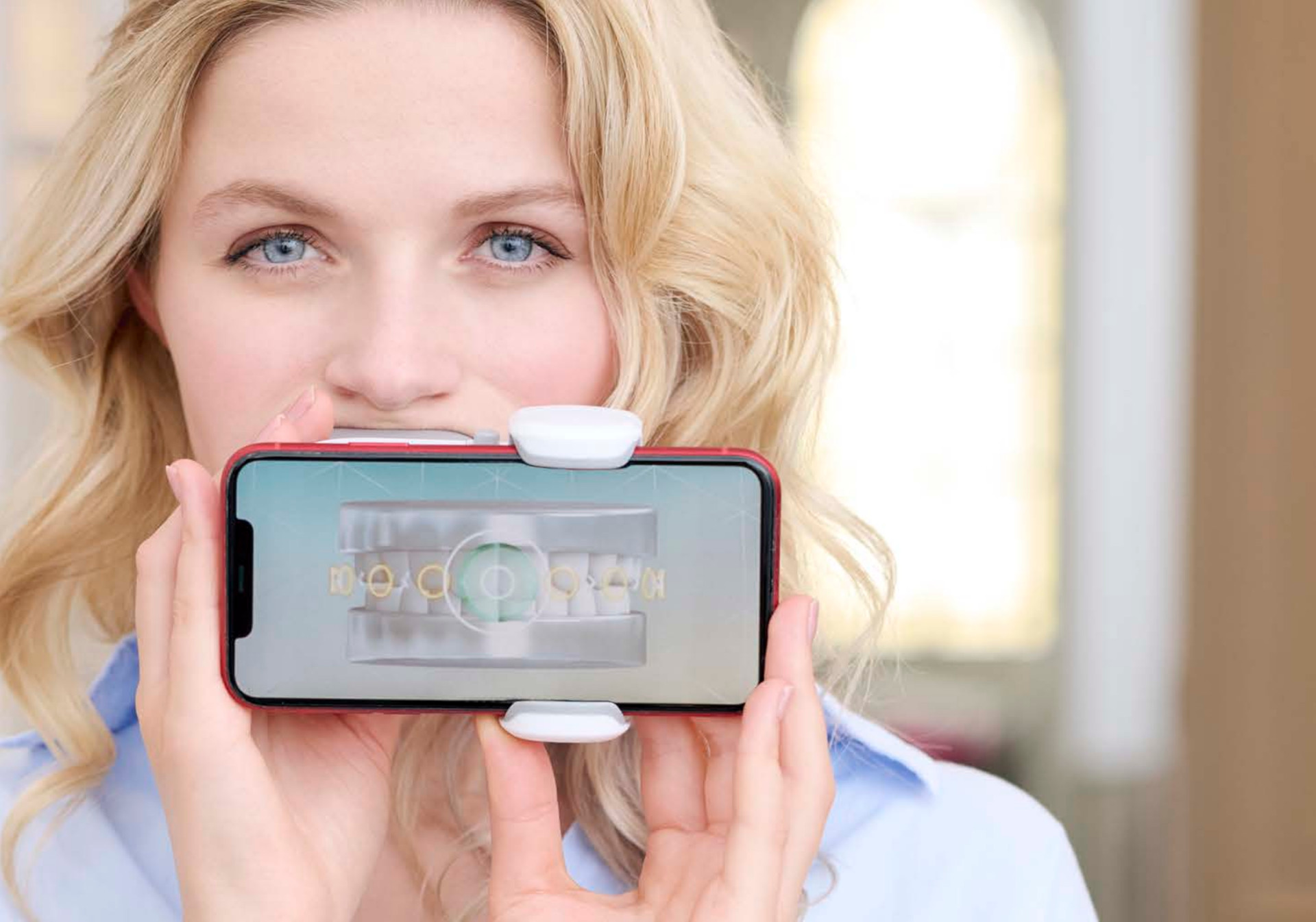 woman using dental monitoring